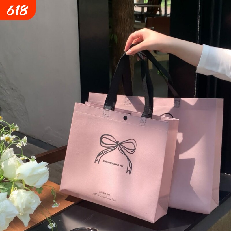服装店无纺布袋手提袋衣服打包袋批发礼品礼袋购物按扣服装袋批发