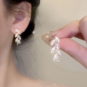 「栀白」珍珠锆石麦穗流苏耳环女气质精致无耳洞蚊香盘耳夹耳饰