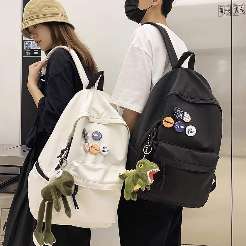双肩包男士大容量旅行包登山包女初中高中大学生挂件背包书包黑色