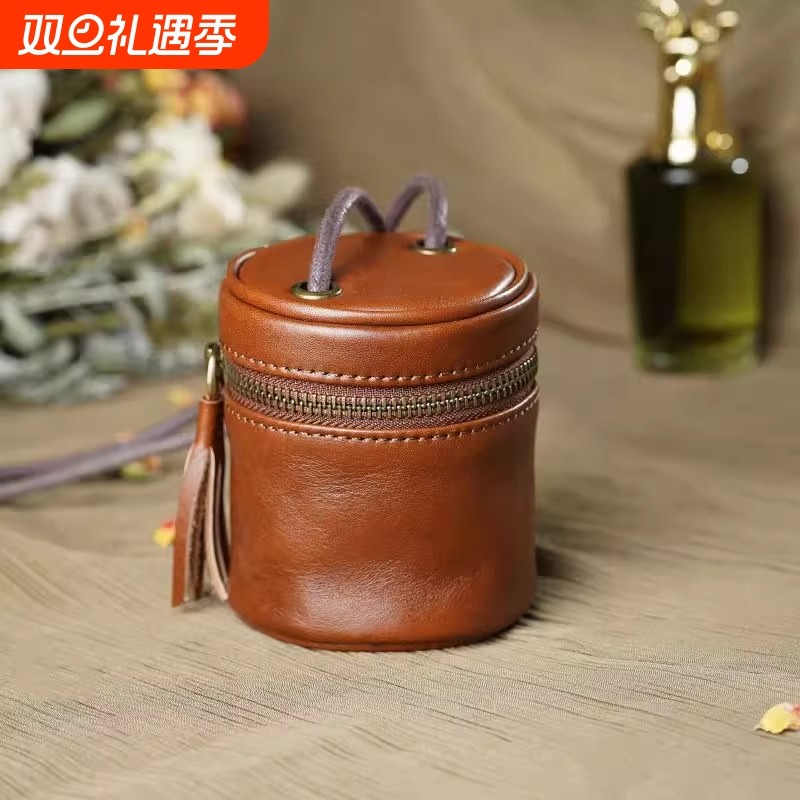 新款2025复古时尚水桶钥匙单肩小包女便携小众耳机手串斜跨零钱包