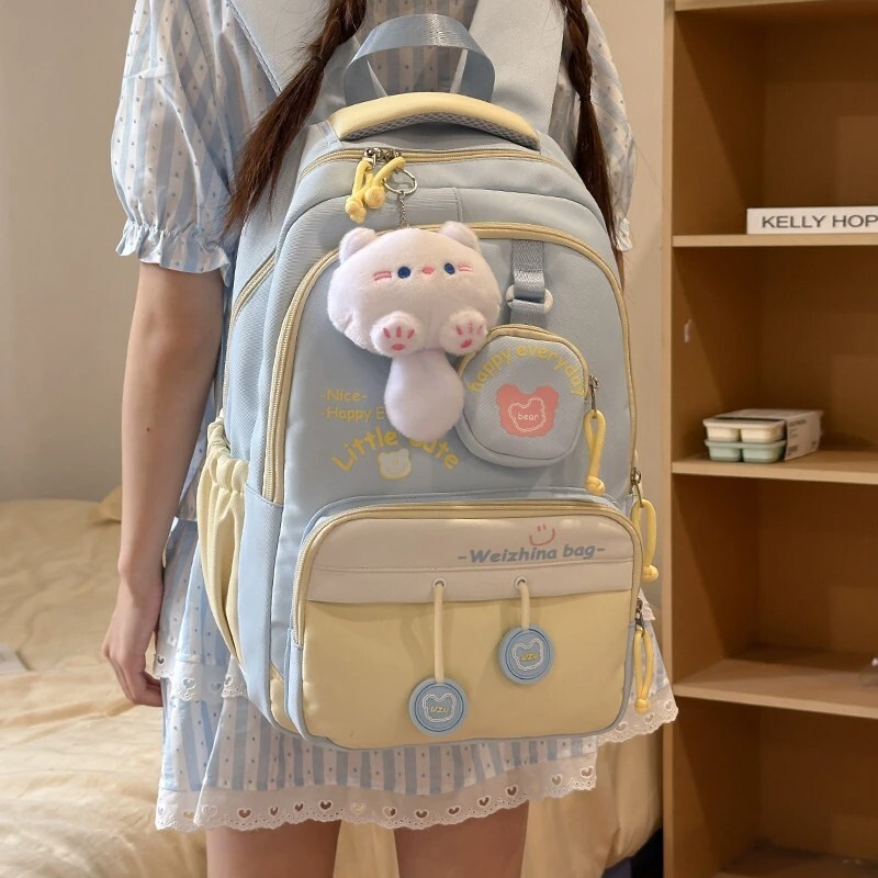 儿童书包女小学生三到六年级初中生轻便减负大容量双肩包高中背包图片