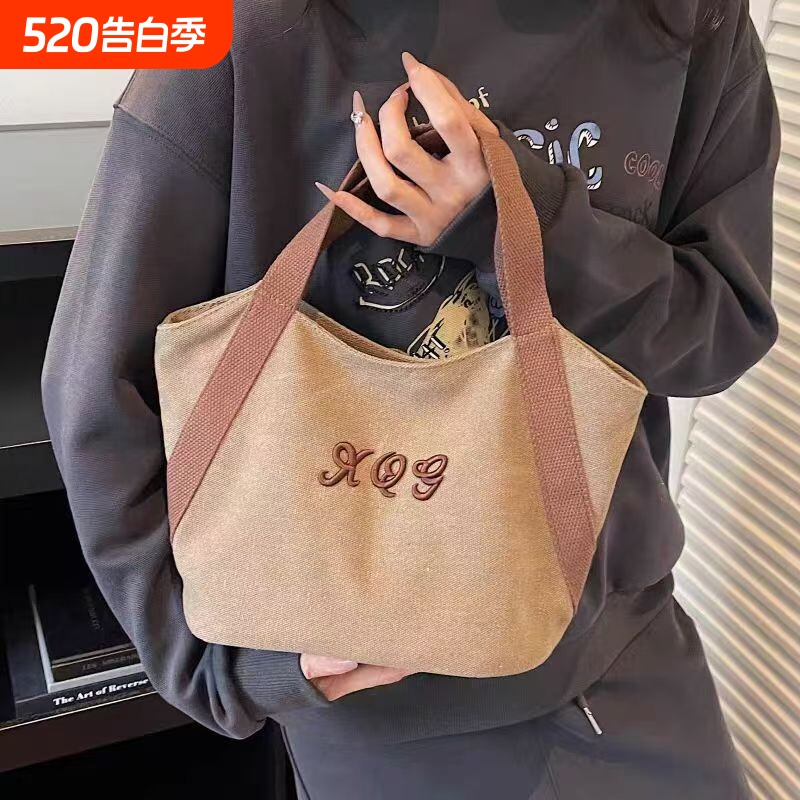 帆布包上班托特拎女包2025新款简约通勤饭盒便当手提包手提小布包