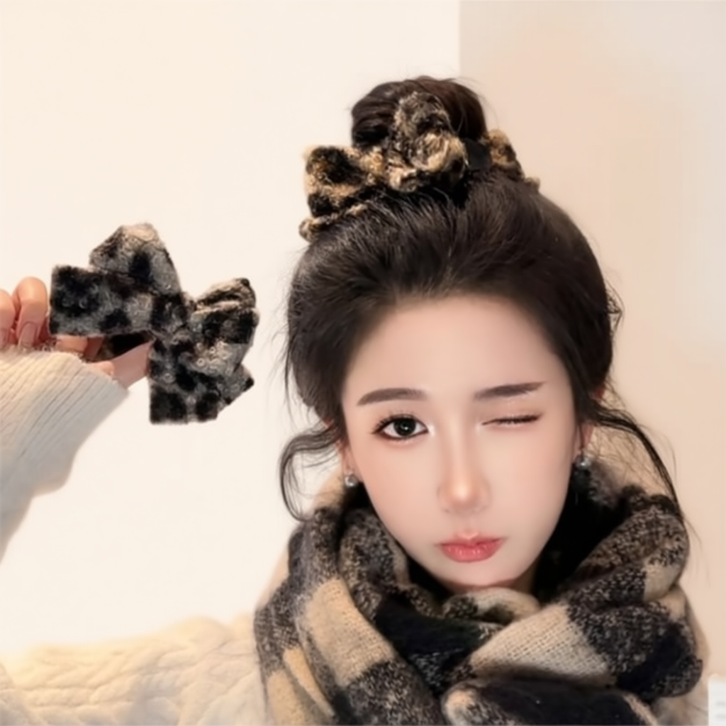 豹纹蝴蝶结丸子头的抓夹2025新款高级感秋冬季精致毛绒发夹头饰女
