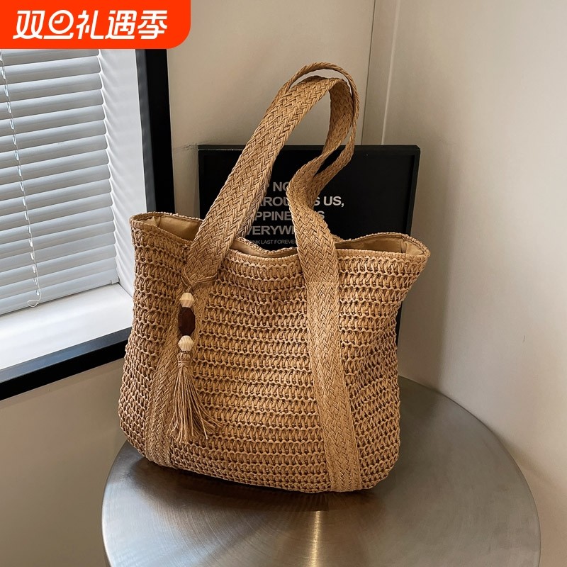 夏日慵懒风草编包女2025新款百搭大容量通勤托特包时尚洋气编织包