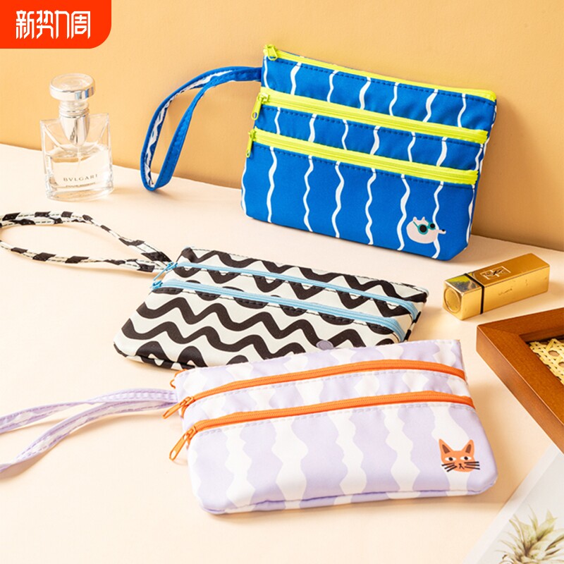 2026新款可爱波浪纹猫咪化妆包女便携旅行化妆品防水收纳包手拿包