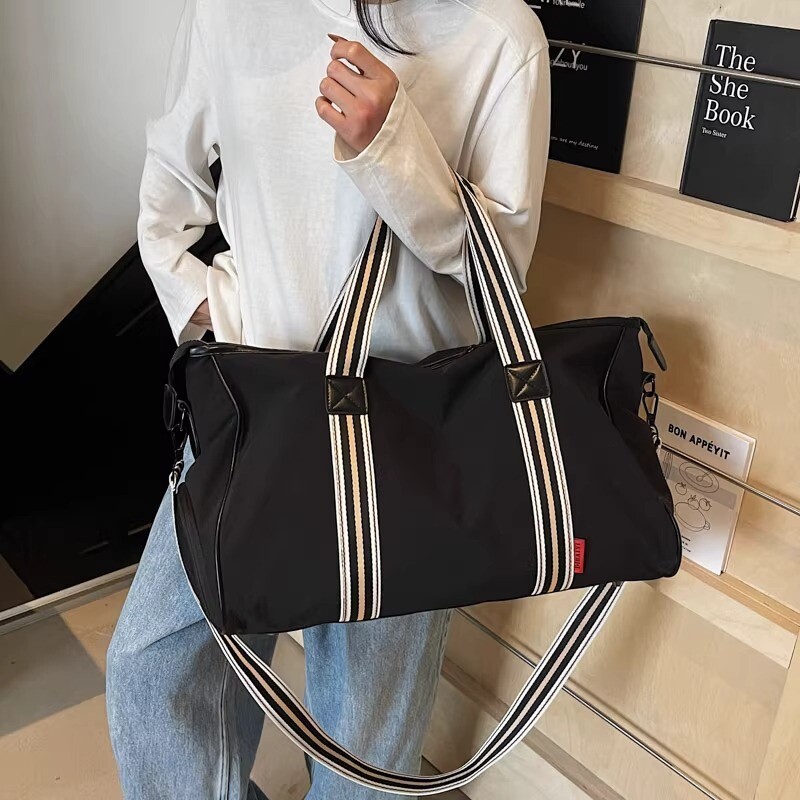 大容量旅行包尼龙防水行李袋手提长短途健身游泳出差包多功能时尚