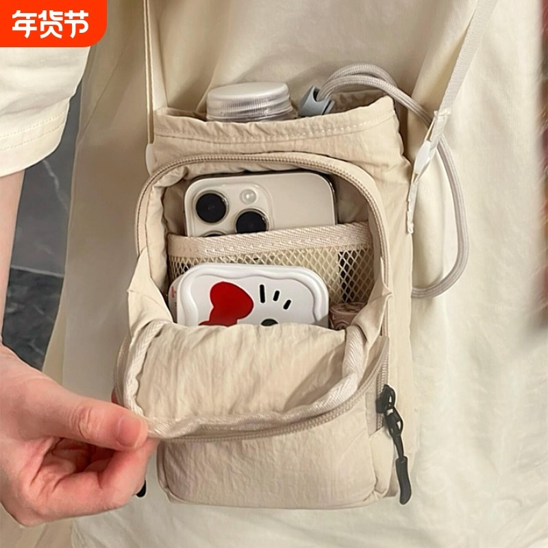 上班通勤包2025雨伞包女斜挎包迷你小包帆布红色新款手提单肩紫色