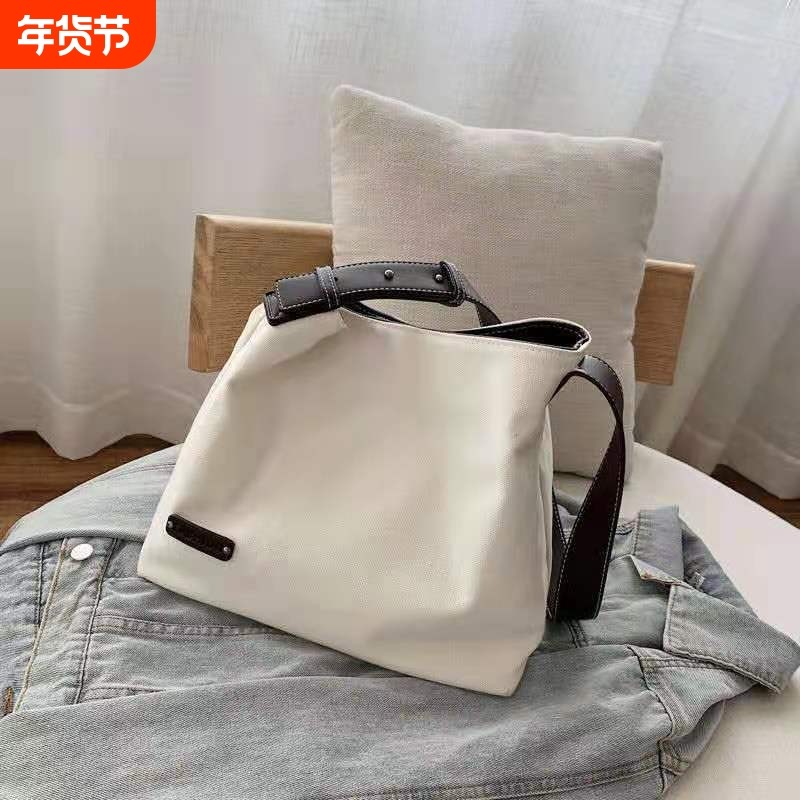 帆布大包包女2023斜挎简约休闲包单肩包学生气质大容量购物袋潮,箱包皮具/热销女包/男包,水桶包,淘宝优惠券,粉丝福利购,淘宝优惠卷