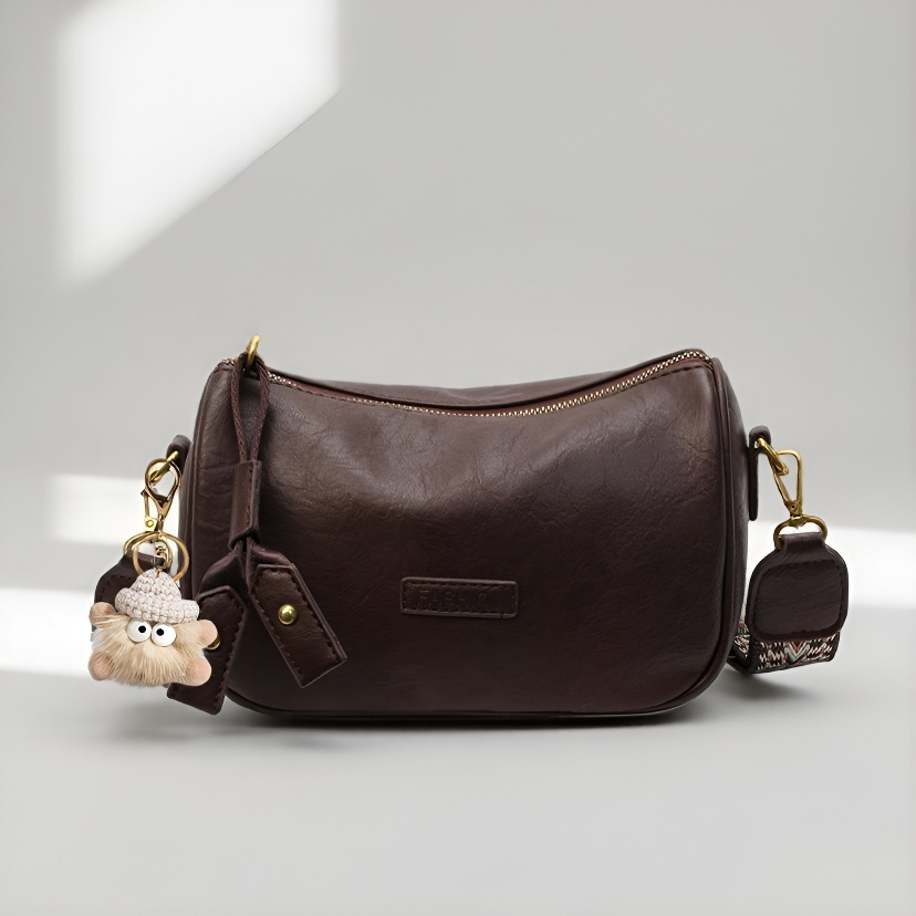 伊布古奇今年流行包包2025新款宽带斜挎包女士复古小众枕头包腰包