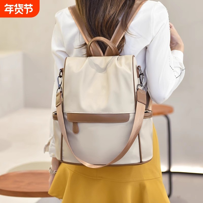 新款双肩包女士牛津布时尚百搭防盗通勤上班族书包防水旅游大容量