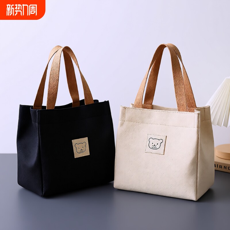 帆布包女2024年通勤新款小布袋上班族包包迷你手提包黑色耐磨超大