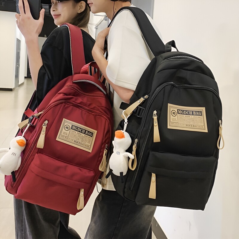 书包双肩包背包初中生女大容量男高中...