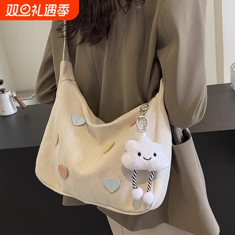 ins百搭帆布包斜挎包女通勤腋下单肩包饺子包大学生大容量云朵