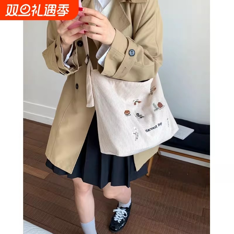 条绒刺绣帆布包包女大容量单肩通勤腋下包小众学生百搭斜挎托特包