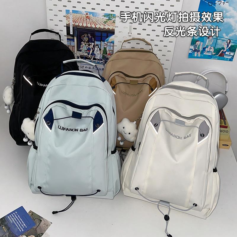 无品牌简约大容量防水旅行包女中学生学生书包日韩百搭双肩包男