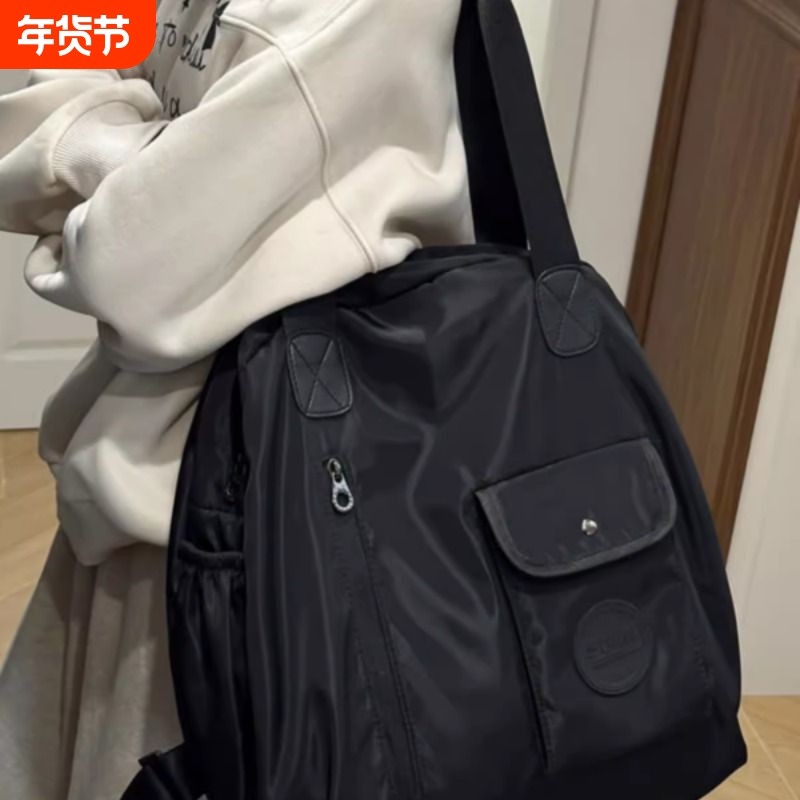 大容量双肩包女2025新款帆布旅游包轻便旅行单肩背包托特包尼龙