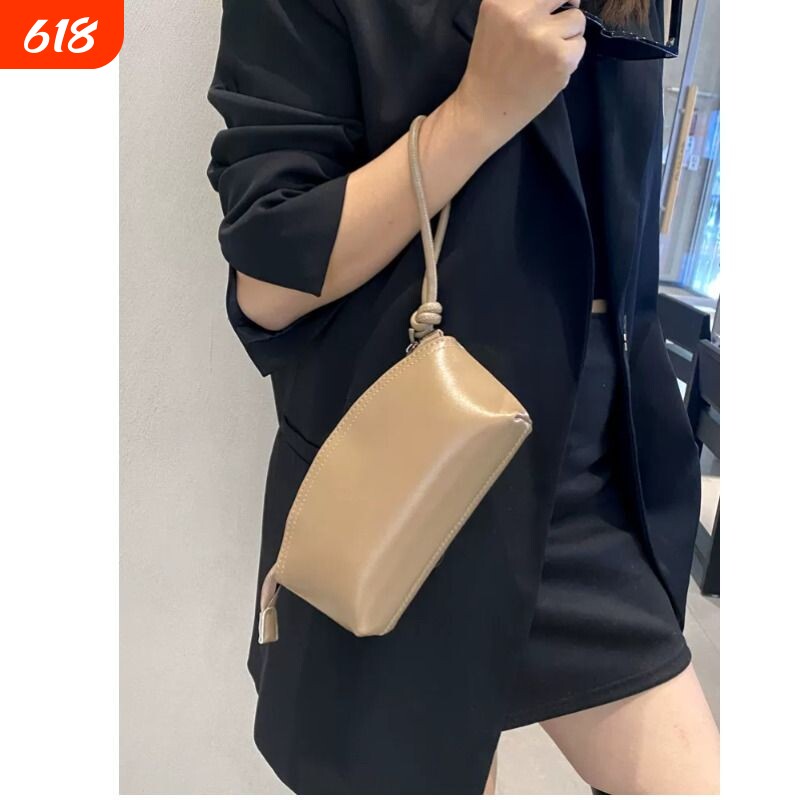 手机包女简约散步小包手腕零钱包手拿包韩版百搭贝壳便携真皮质感