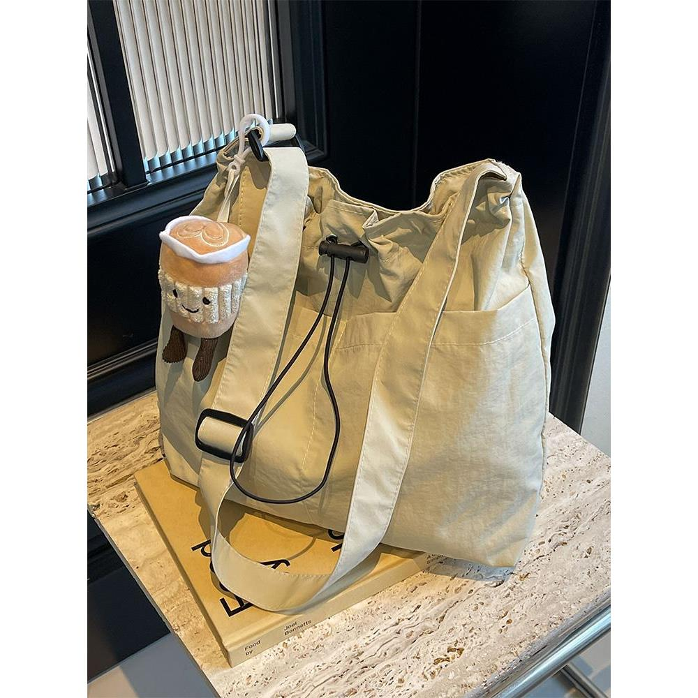 大包包女2025新款时尚布包单肩包大容量托特包上课通勤斜挎包帆布