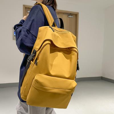 韩版大容量纯色双肩包女生百搭森系简约高中大学生书包休闲背包男