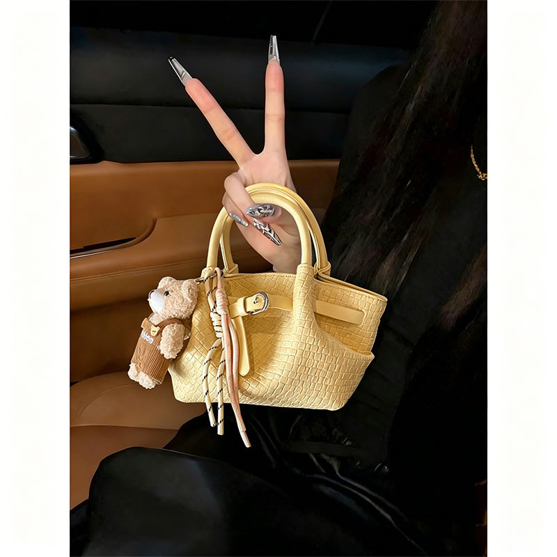 黄色编织手提包包女士2026新款夏季高级感菜篮子水桶包单肩斜挎包