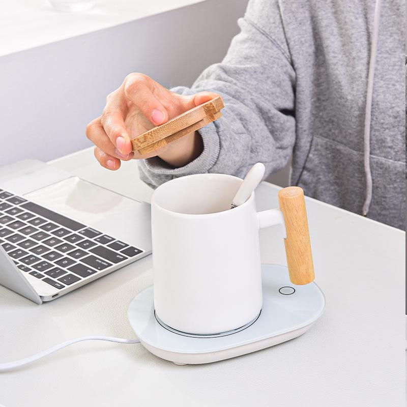 木柄北欧恒温杯子水杯咖啡家用陶瓷勺保温暖暖杯创意55度马克加热