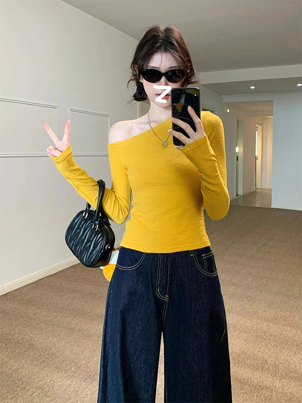 黄色斜肩长袖T恤女春秋欧货不规则修身显瘦性感露肩打底衫上衣