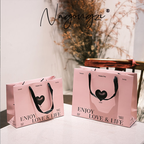 清仓服装袋子手提袋礼品袋加厚纸购物袋包装礼物袋粉色logo袋子