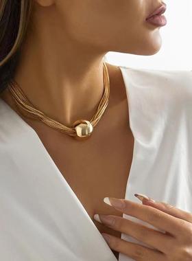 Stacked necklaces with geometric spheres and multi-layered