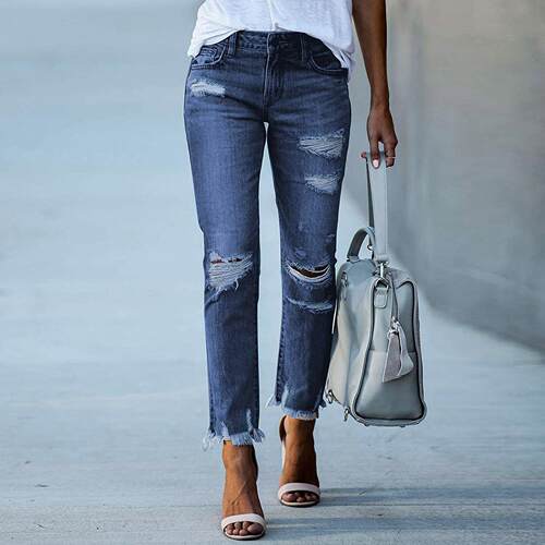 Tight white denim ripped jeans
