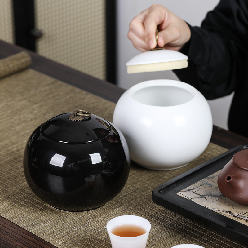 勤锋陶瓷德化黑白双色茶叶罐促销