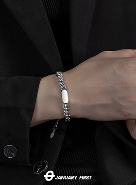 男钛钢原创设计古巴光牌手链