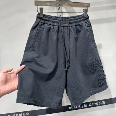 重磅纯棉水洗做旧贴布裁剪短裤