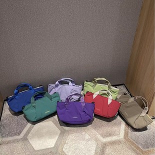 韩国运动风轻便水桶包小号简约撞色手机包亲肤尼龙布百搭斜挎包