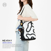 尼睿新款 小煤球百搭小众休闲六边形包单肩书店大容量帆布包Z006