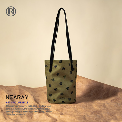 尼睿简约百搭设计感水桶包