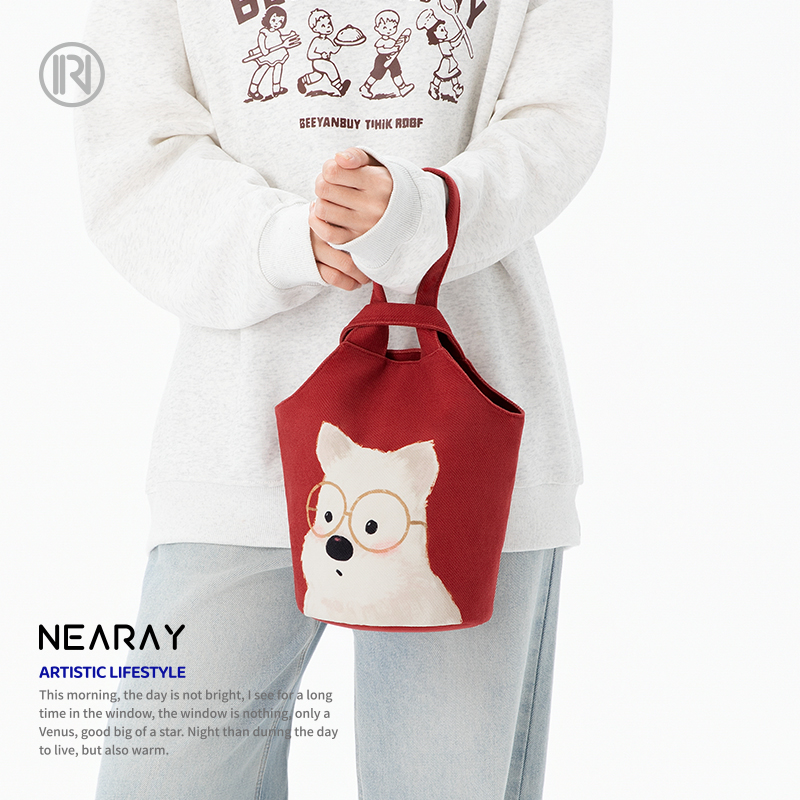 尼睿新款可爱小狗手提包红色复古帆布手拎袋休闲百搭水桶包包女AS