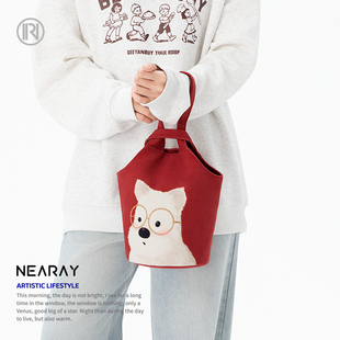 尼睿新款 可爱小狗手提包红色复古帆布手拎袋休闲百搭水桶包包女AS