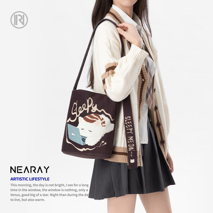 尼睿新款原创小众可爱猫咪大容量单肩帆布包日常通勤水桶包Z084