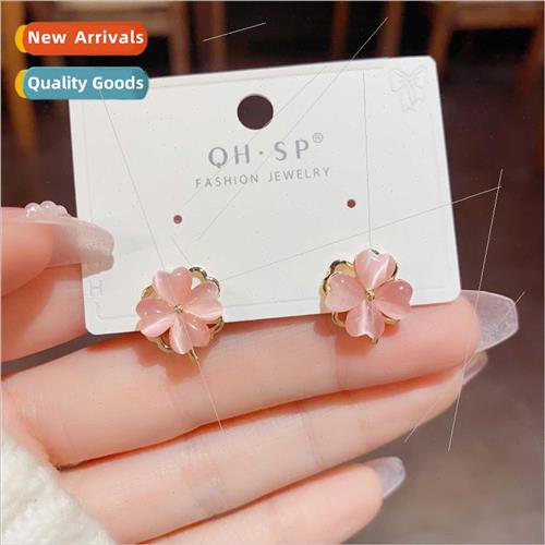 Cat eye stone four-leaf flower rotating earrings 2023 new ni