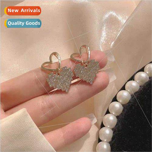 Love earrings 2023 new tide earrings cold wind irregular hea