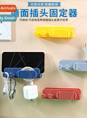 Multi-functional cell phone charging plug fixer sticky hook