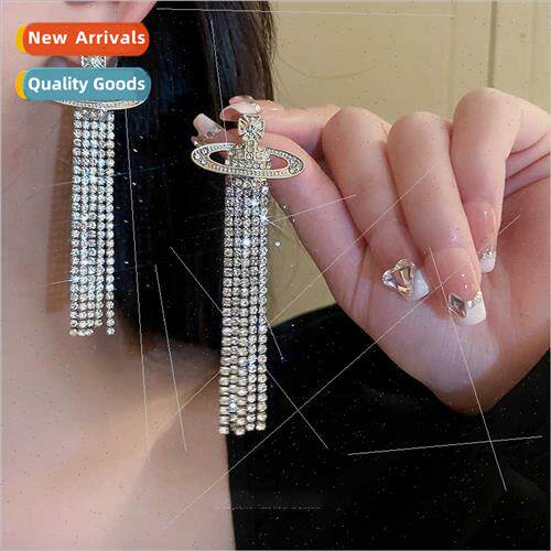 Saturn inves sexy burst hollowed out planet tassel earrings