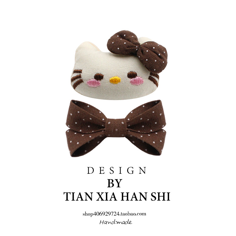宝宝可爱凯蒂猫立体布艺发夹女孩咖色波点蝴蝶结边夹百搭女童头饰图片