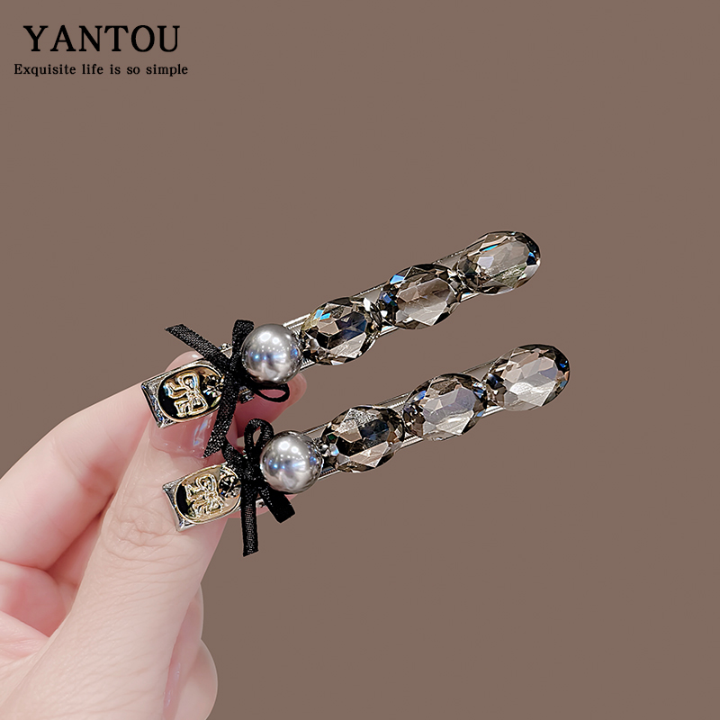 水钻黑色蝴蝶结侧边刘海发夹