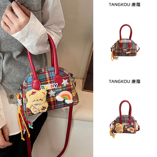 可爱女童包包2025新款女生斜挎小布包儿童手提小拎包卡通保龄球包