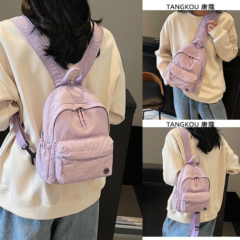双肩斜挎两用包女2025新款轻便旅游小背包骑行帆布胸包运动登山包