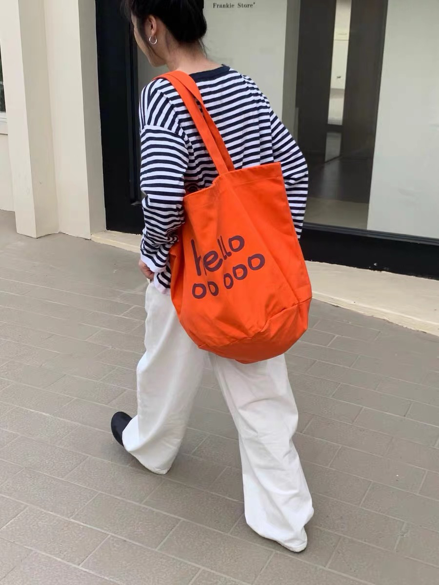 2025年春季新款字母印花单肩帆布包大容量学生潮流托特女包购物袋