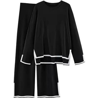 Two slit long sleeved knitted shirt checkered high waisted