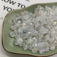 Белый роговой бисер разных размеров (50 г в пакетике)