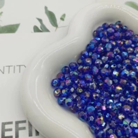Темно-синие бусины из рогов разных размеров (50 г в пакетике)